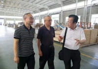 中国木材与木制品协会领导莅临千川木门视察调研