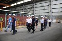 攀钢集团董事长段向东一行莅临和乐门业参观调研