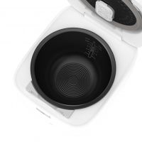 封装繁杂，释放简单：电饭煲的秘密武器