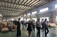 2019全球地产板门定制家居GDCC峰会暨浙江省门业协会参会人员 前来兔宝宝家居产业园区进行参观访问