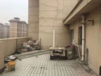 就为多个露台才买的顶楼，结果女儿墙1米8，想拆低物业给我翻白眼
