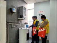 新浪家居验房团首场品牌培训走访德国菲斯曼，双方签订战略合作协议