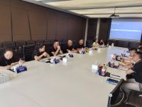 重庆兄弟装饰莅临老板电器进行参观交流，强强联合挖掘深度合作无限可能