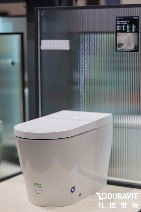 A toilet in a bathroom AI-generated content may be incorrect.